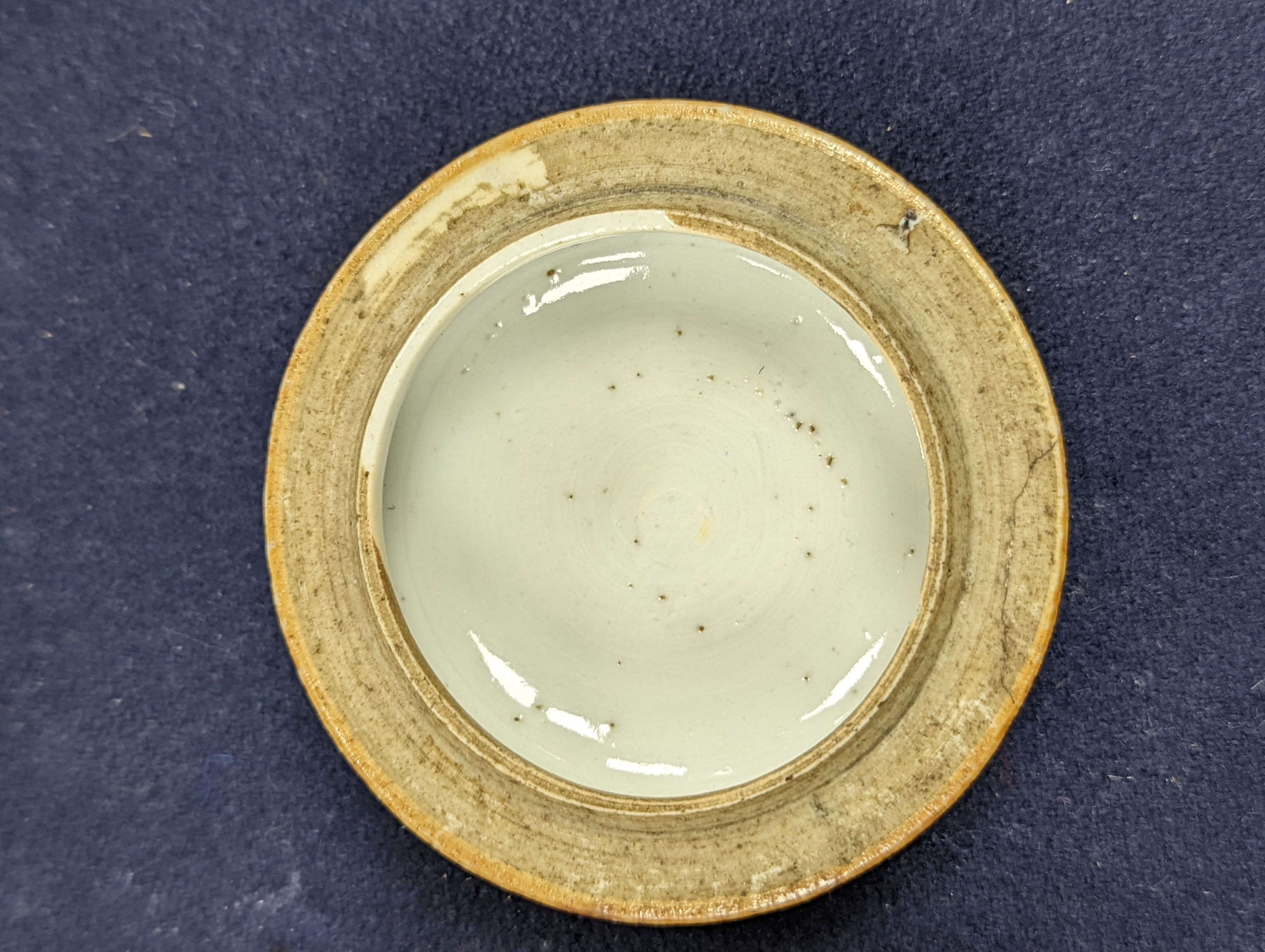 A Chinese cafe au lait glazed saucer, three bowls and a stem cup